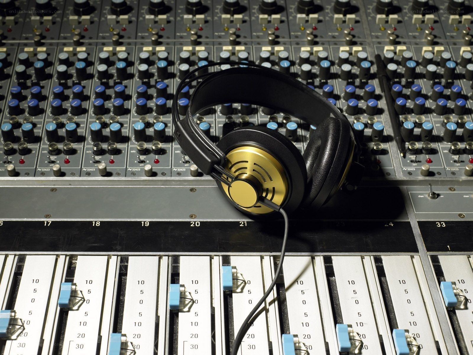 Headphones on a mixing console