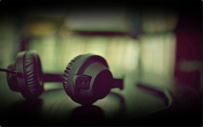 headphones on a wooden surface