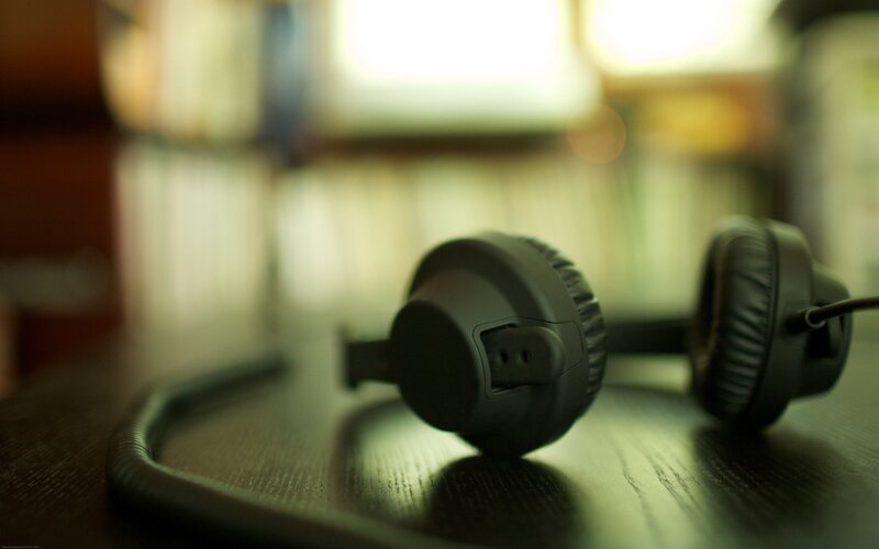 headphones on a wooden table