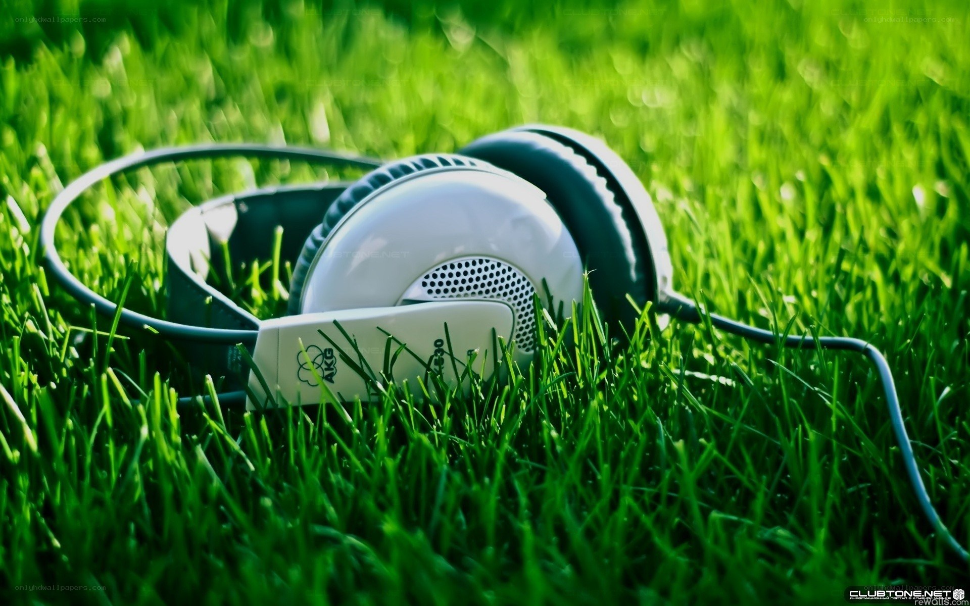 Headphones on green grass