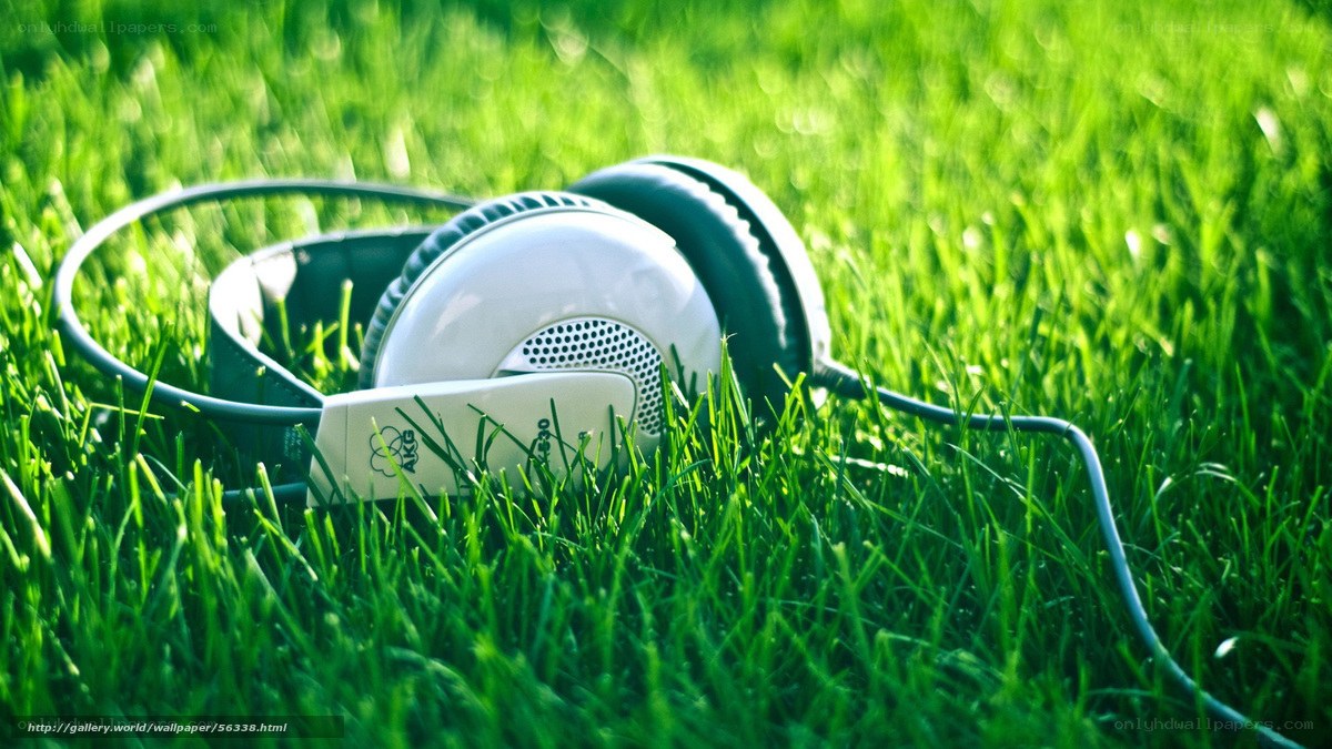 Headphones on green grass