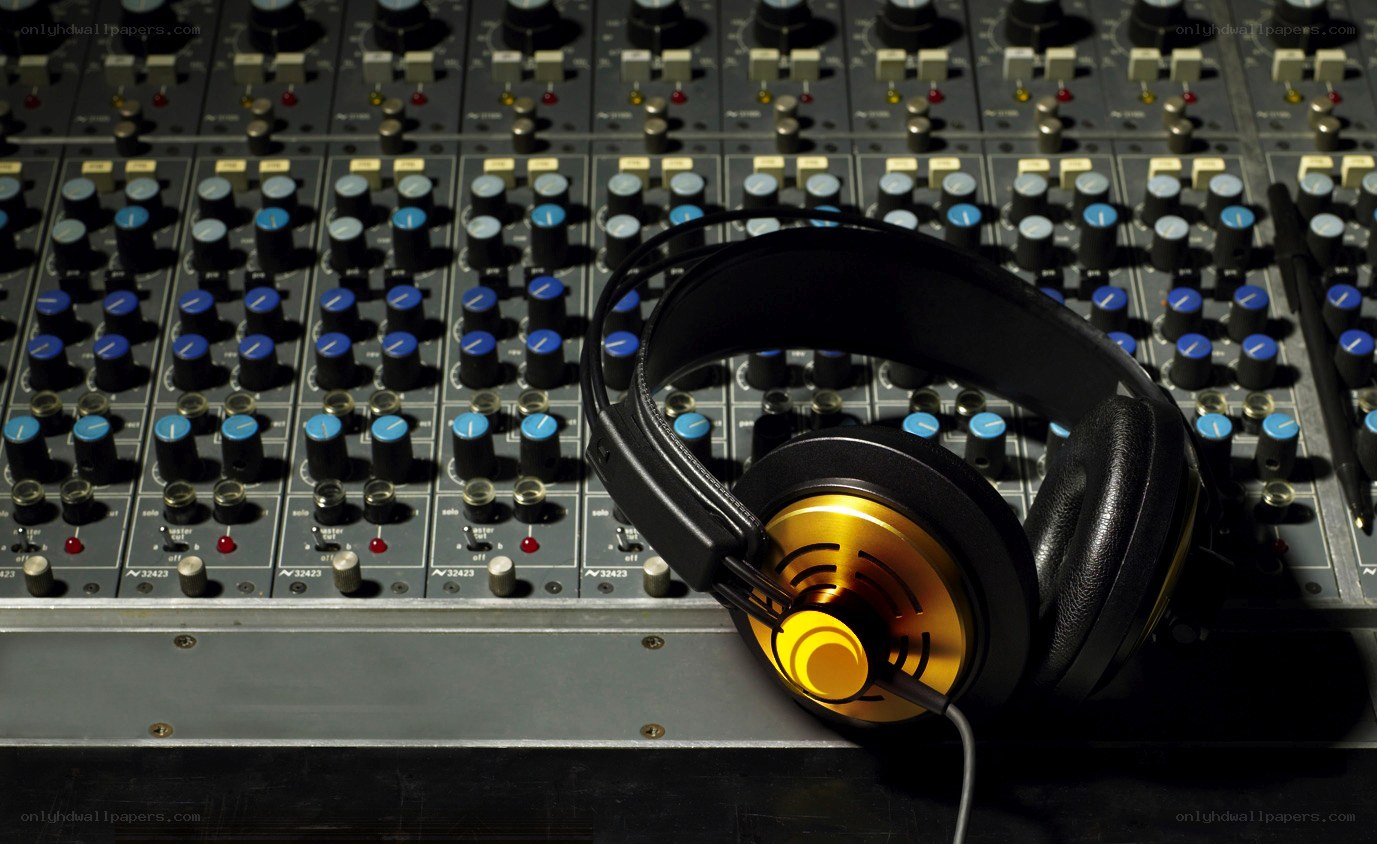 headphones on mixing console