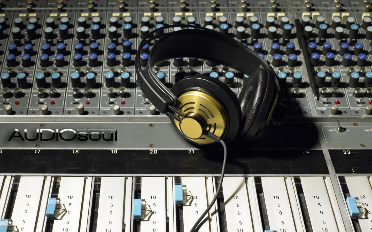 headphones on mixing console