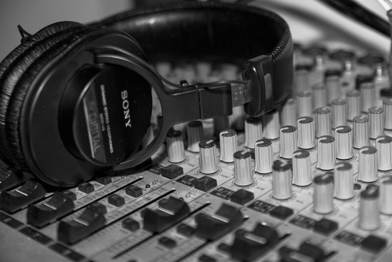 headphones on mixing console