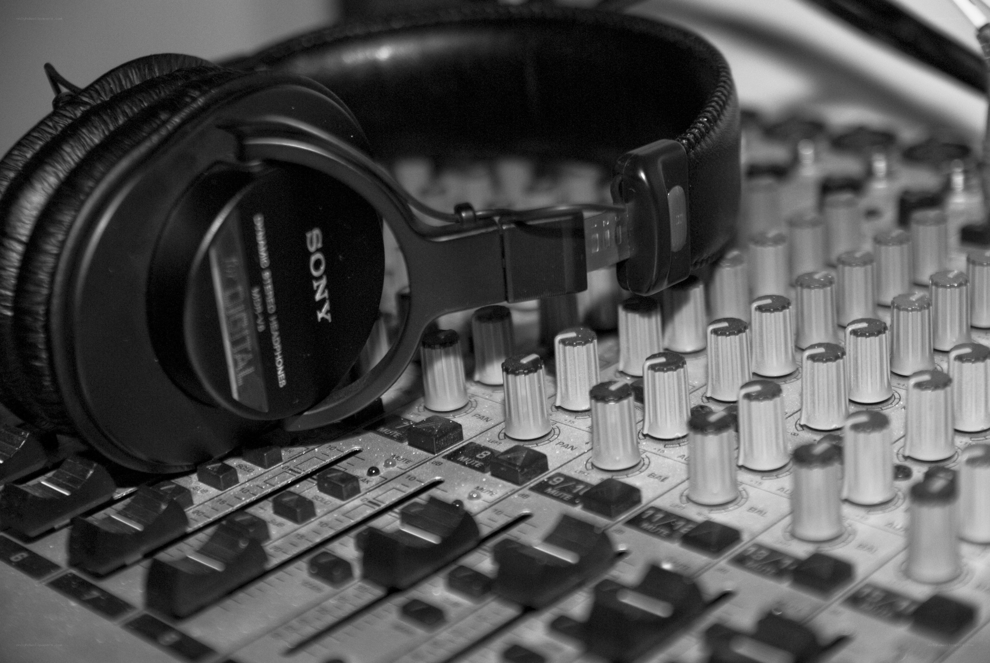 headphones on mixing console