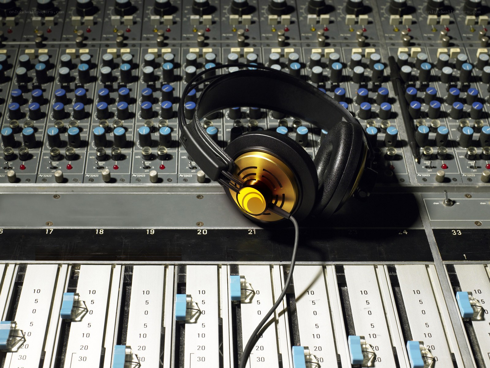 Headphones on mixing console