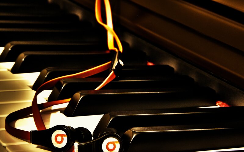 Headphones on Piano Keys