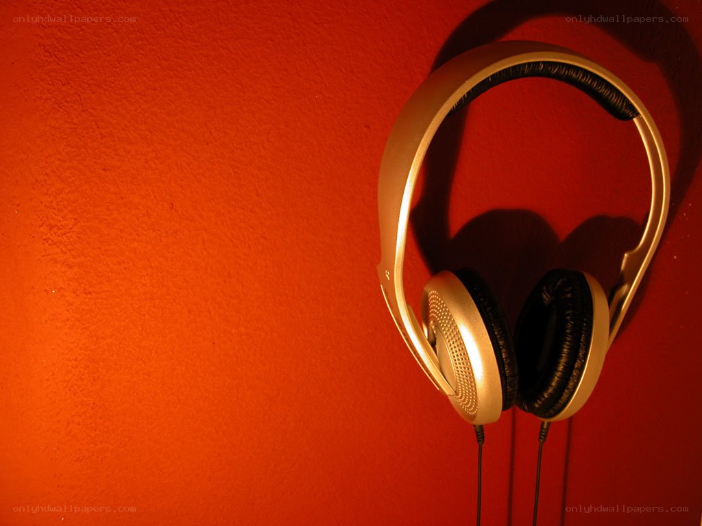 headphones on red wall