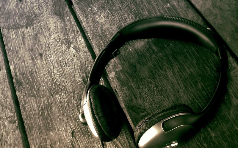 headphones on wooden surface