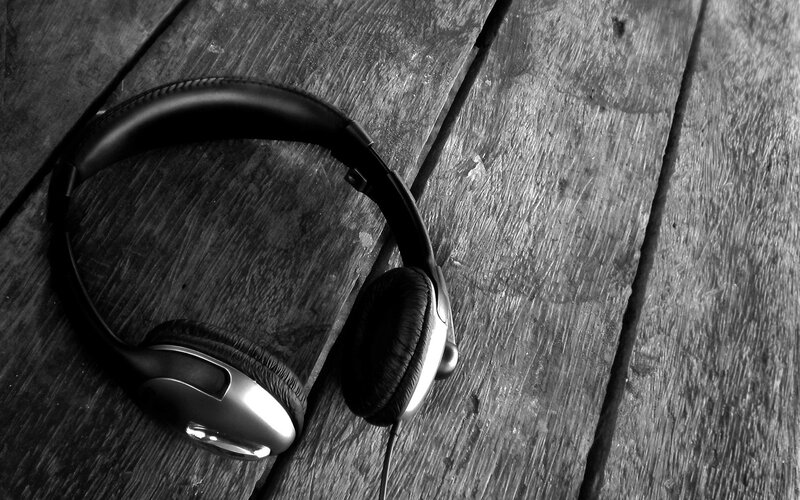 headphones on wooden surface