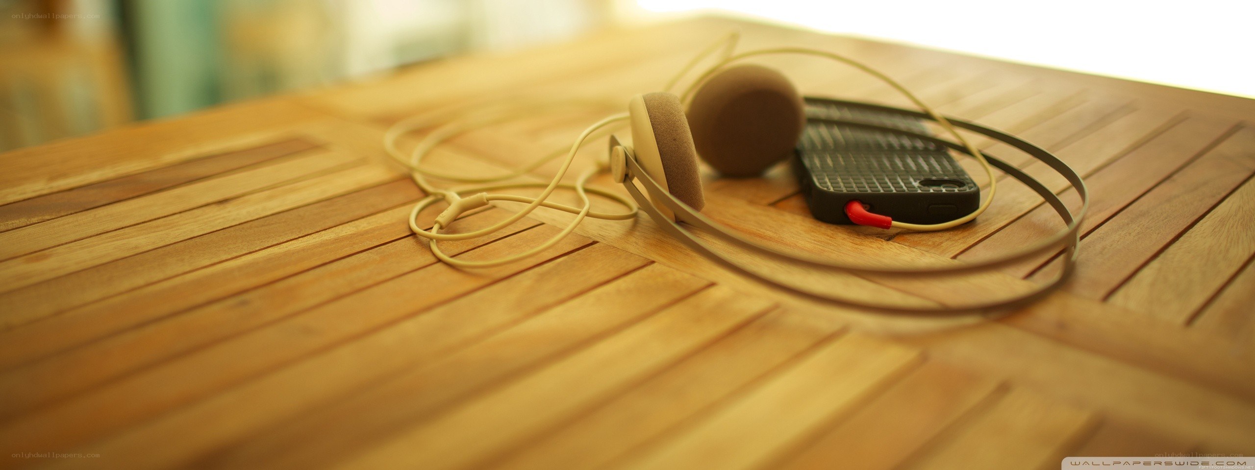 headphones on wooden table