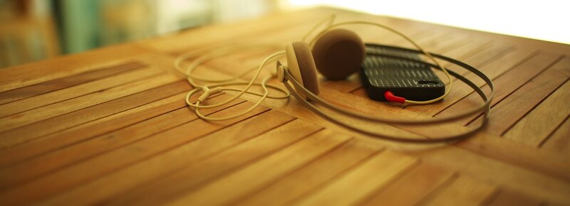 Headphones on Wooden Table — Brown, Calm