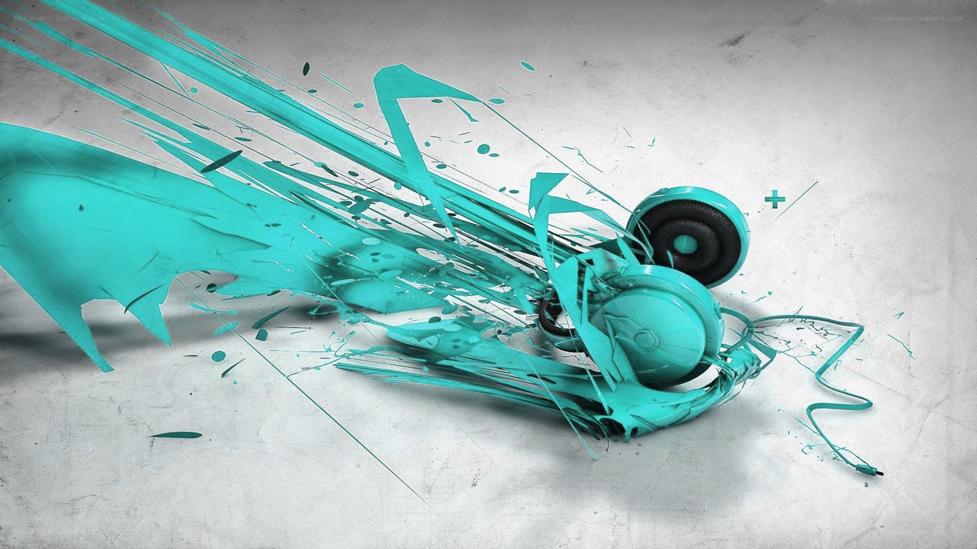 headphones with teal paint splatter