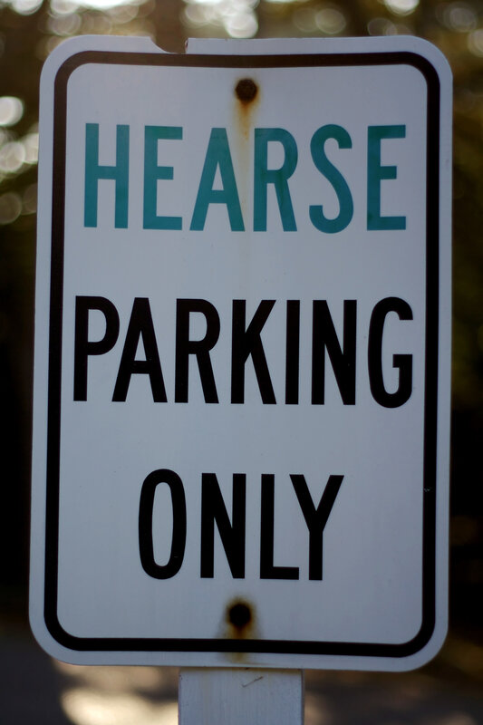 Hearse parking only sign