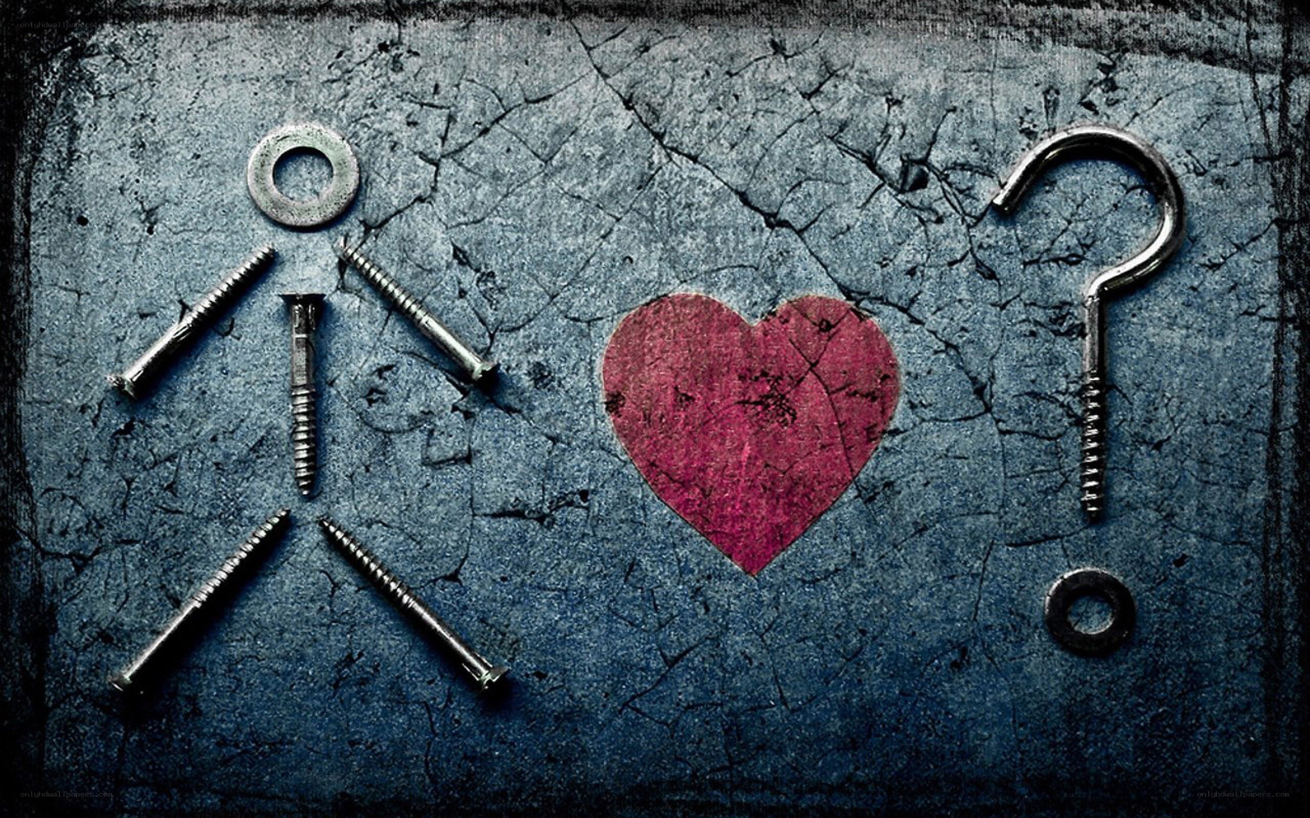 Heart and question mark with screws