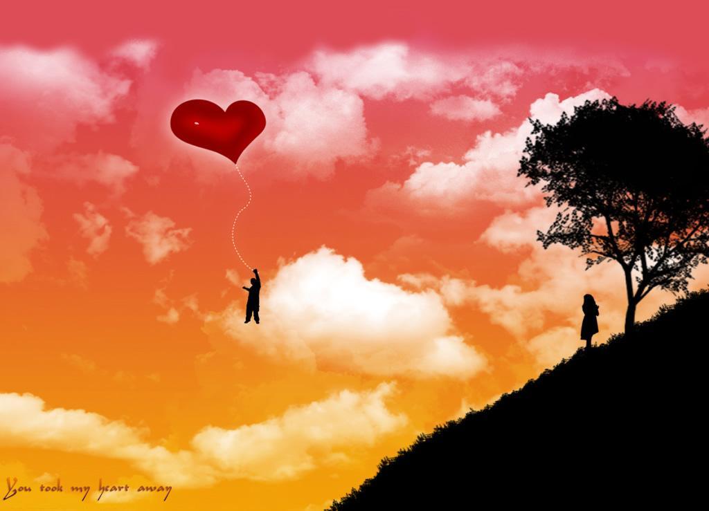 Heart balloon at sunset