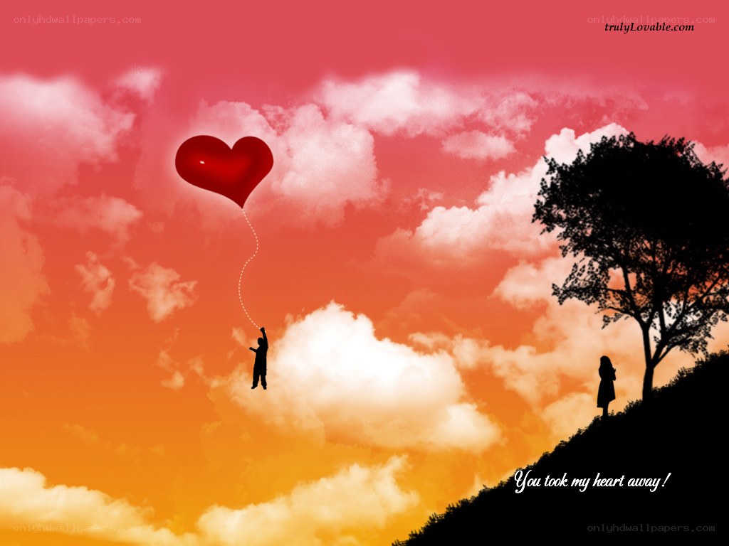 Heart balloon in sunset sky