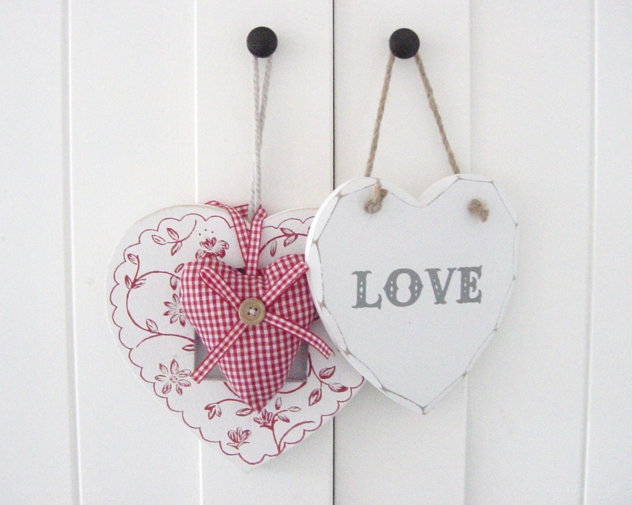 heart decorations on white door