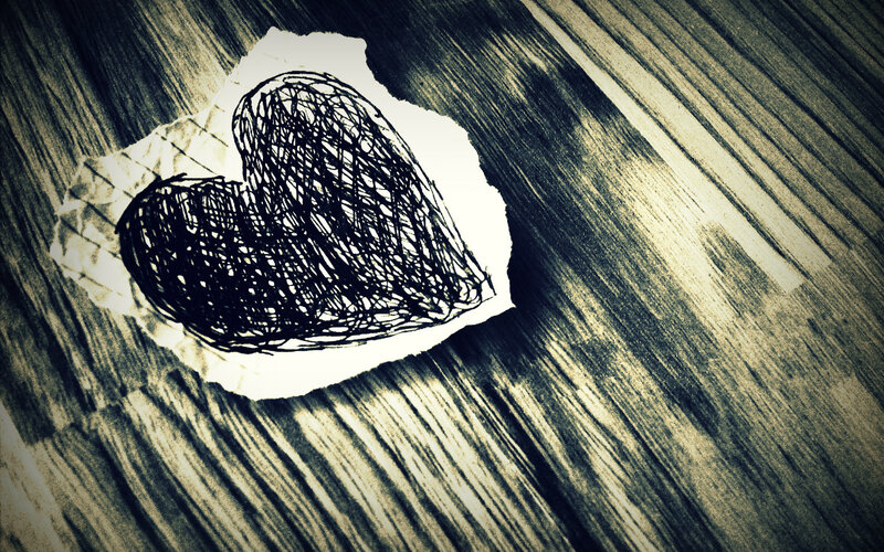 heart drawing on torn paper