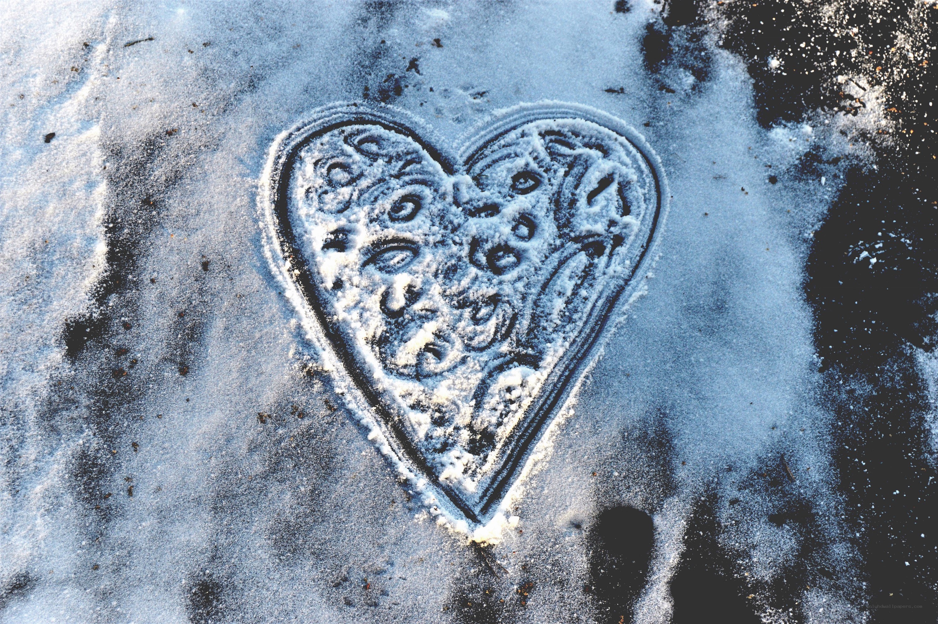 heart drawn in snow