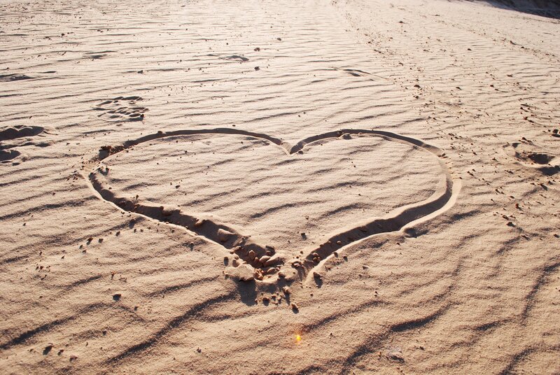 heart drawn in the sand