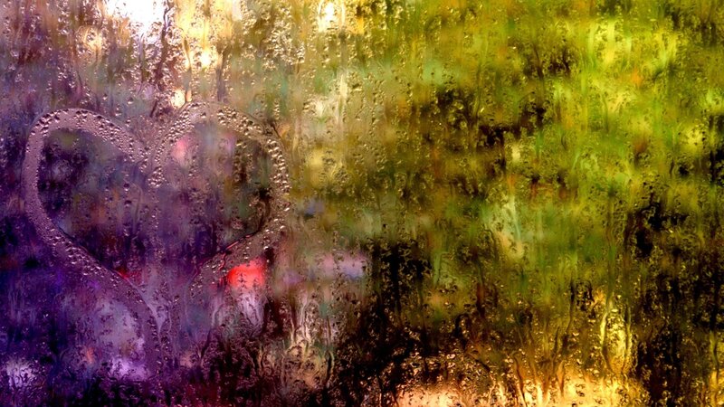heart drawn on a rainy window