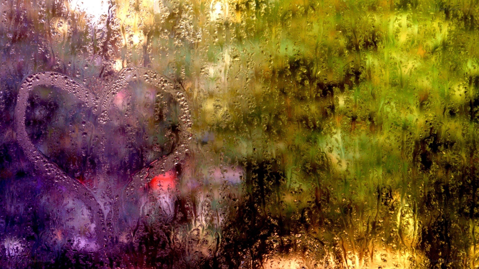 heart drawn on a rainy window