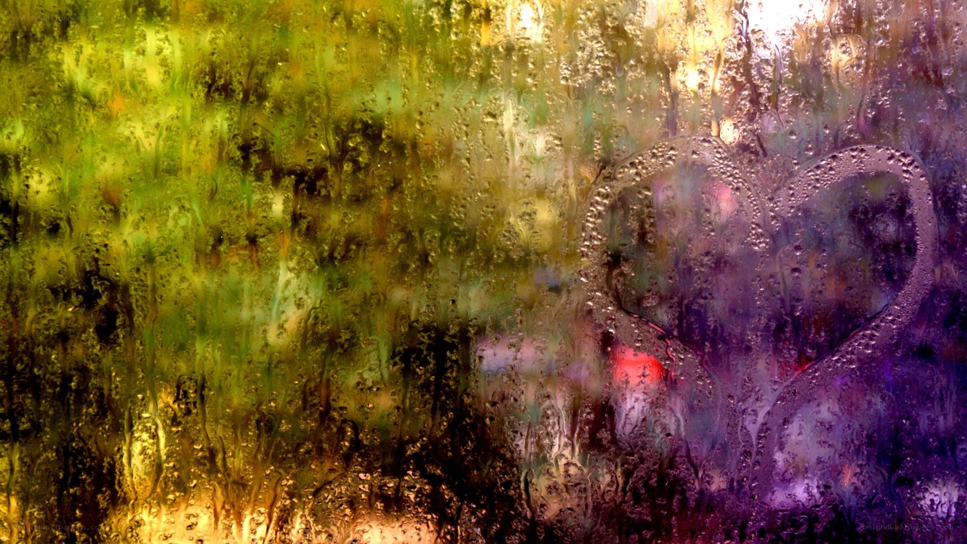 heart drawn on a rainy window
