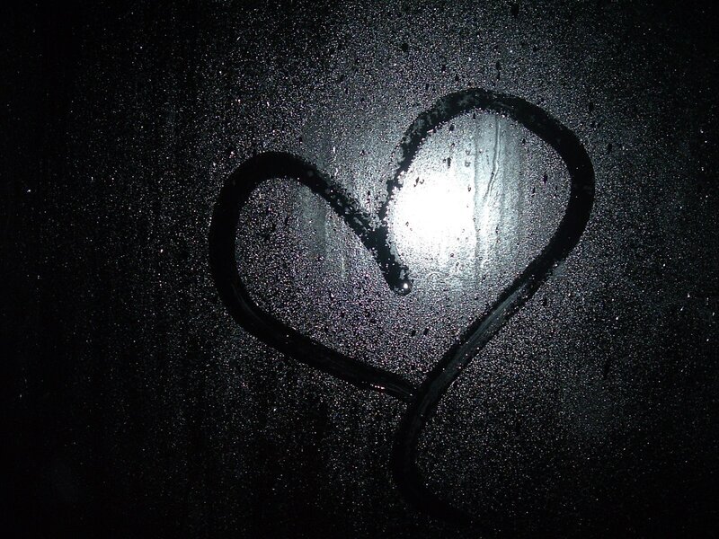 heart drawn on fogged glass