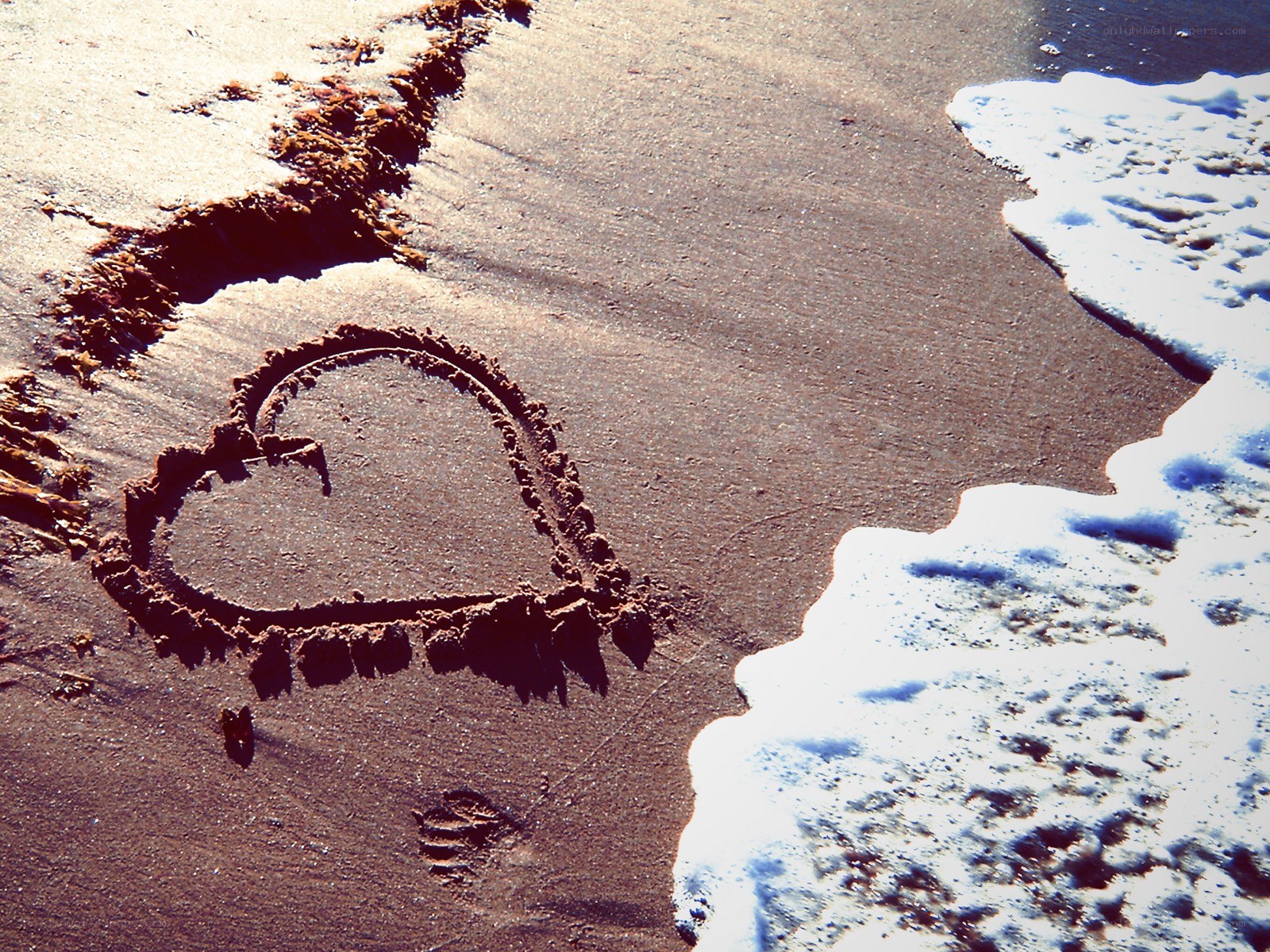 Heart drawn on the beach
