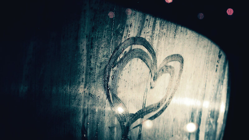 heart drawn on wet glass