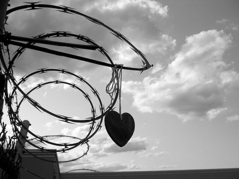 Heart Hanging from Barbed Wire
