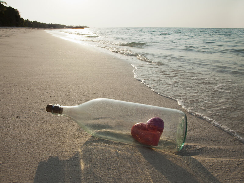 Heart in Bottle on Beach