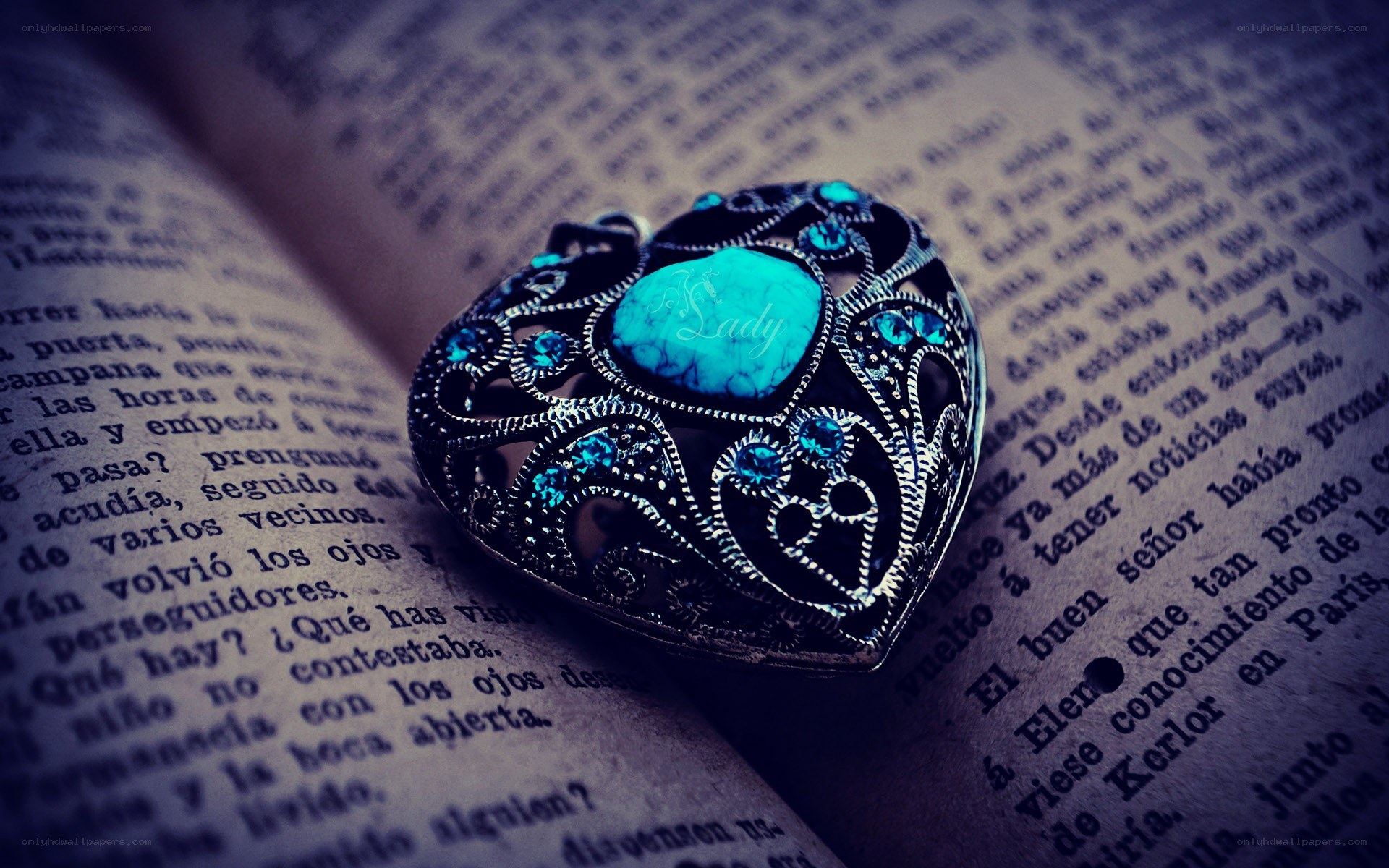 heart locket on book page