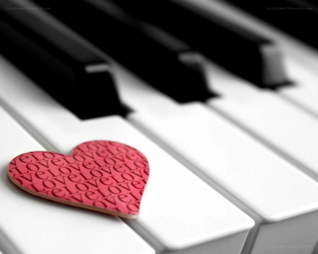 heart on piano keys