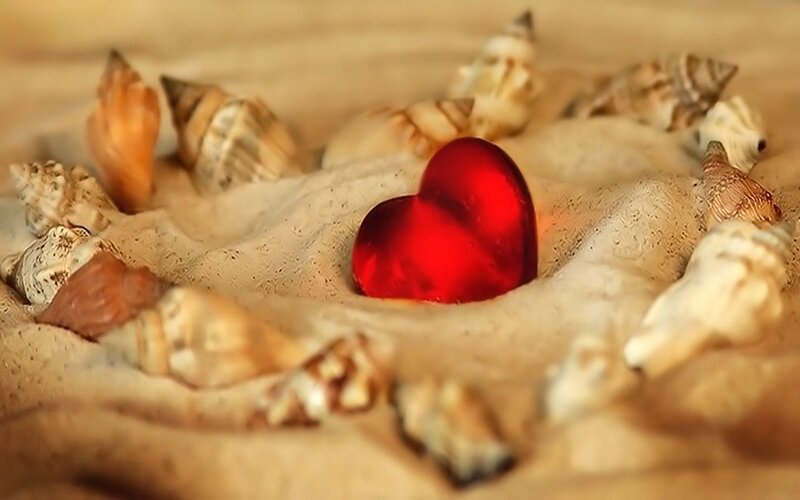 heart on sandy beach