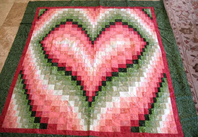 Heart quilt with pixel art design