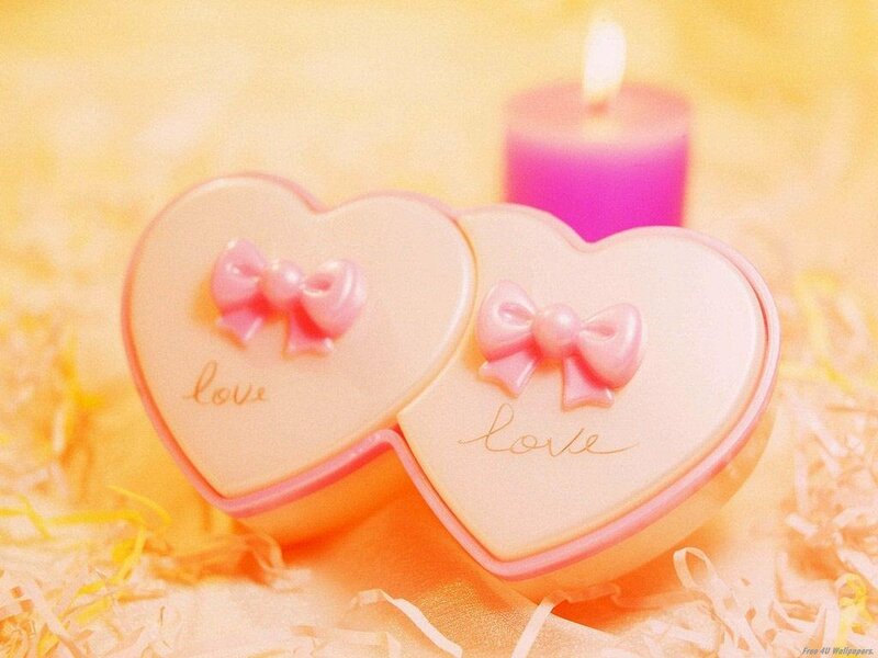 heart-shaped boxes with candles