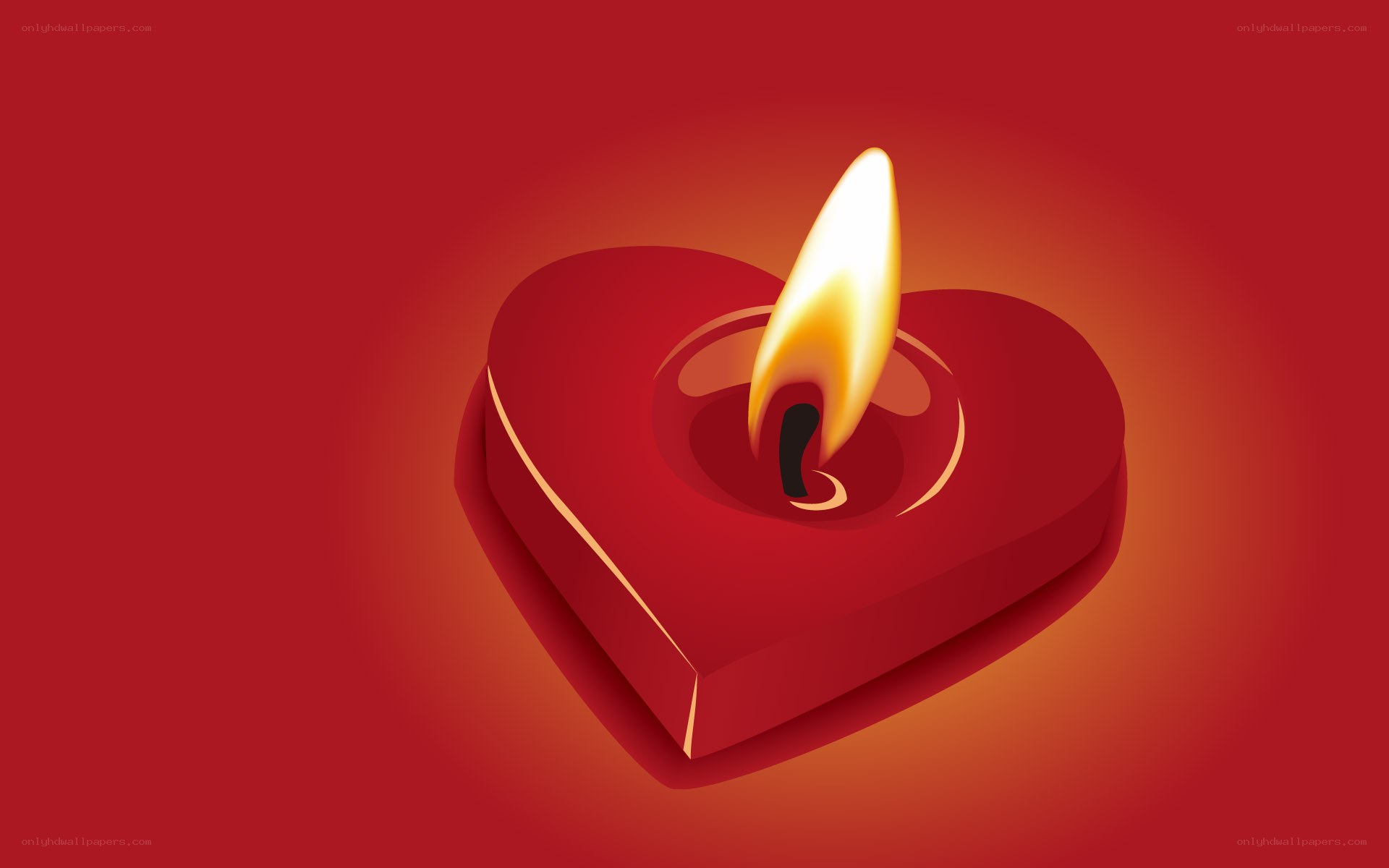 heart-shaped candle burning
