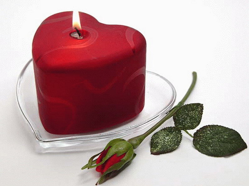 heart-shaped candle with rose