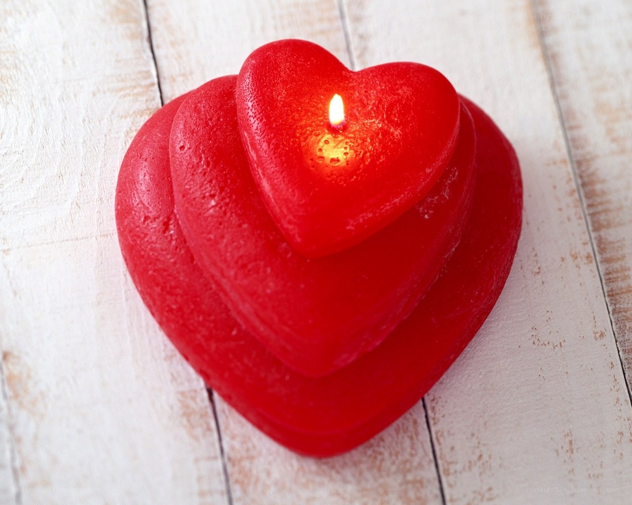 heart-shaped candles lit