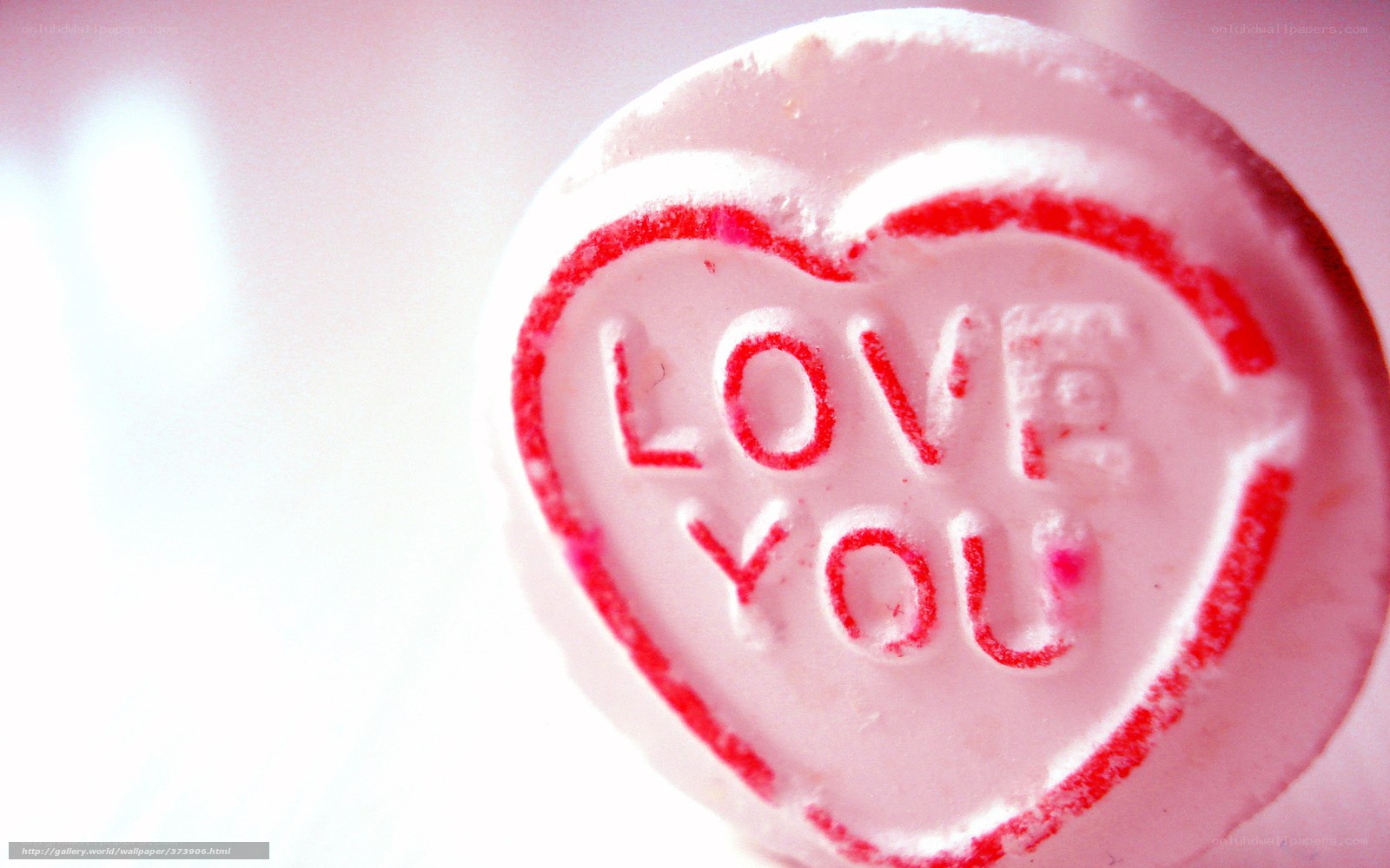 heart-shaped candy with love message