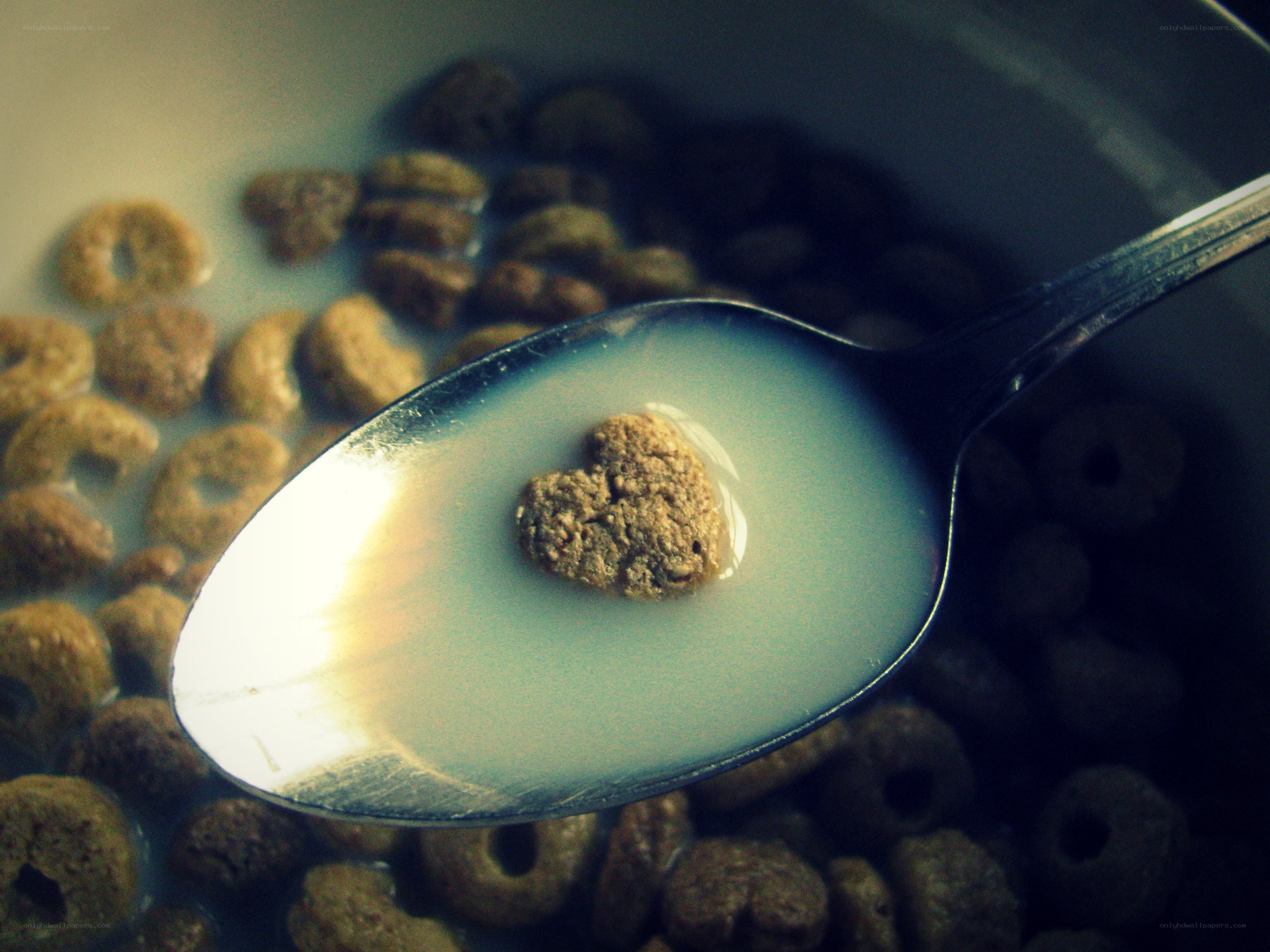heart-shaped cereal on a spoon