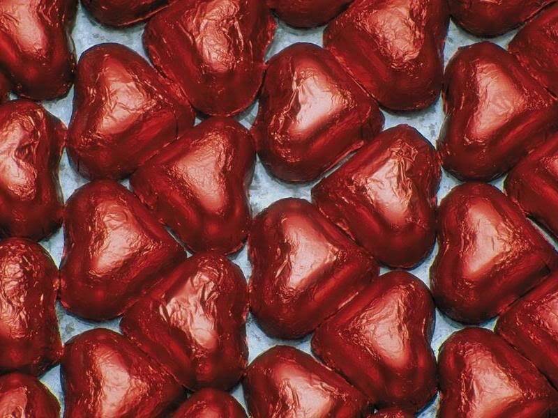 Heart-shaped chocolates in red foil