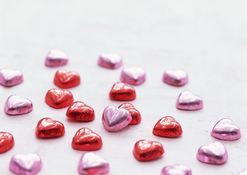 heart-shaped chocolates on white