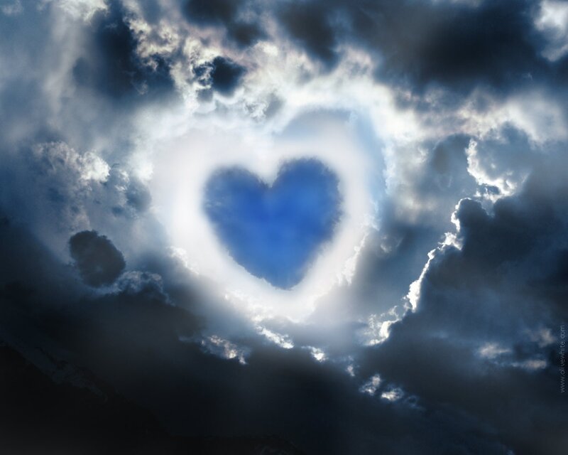 heart-shaped cloud in stormy sky