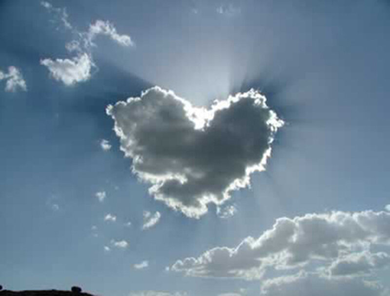 heart-shaped cloud in the sky