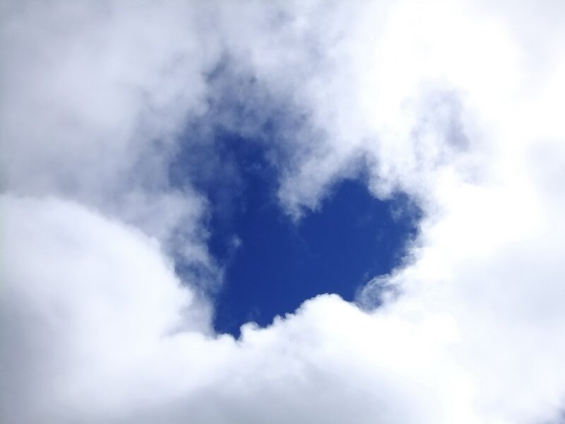 heart-shaped cloud opening