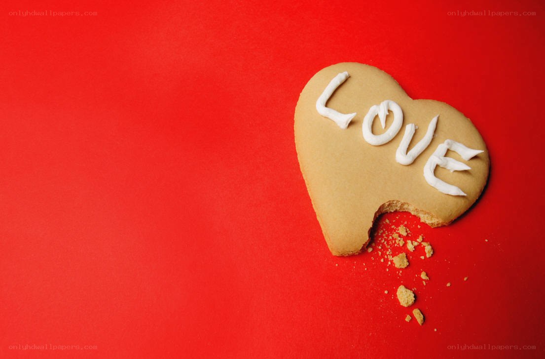 Heart-shaped cookie with bite taken
