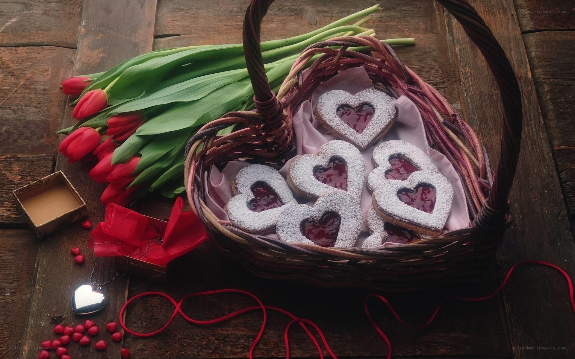Heart-shaped cookies and tulips